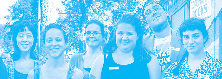 A cyan monotone portrait of six Two Bettys Green Cleaning cleaners standing together