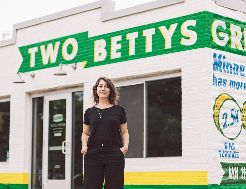 Two Bettys Green Cleaning Founder and Owner, Anna Tsantir, standing outside of Two Bettys Refill station