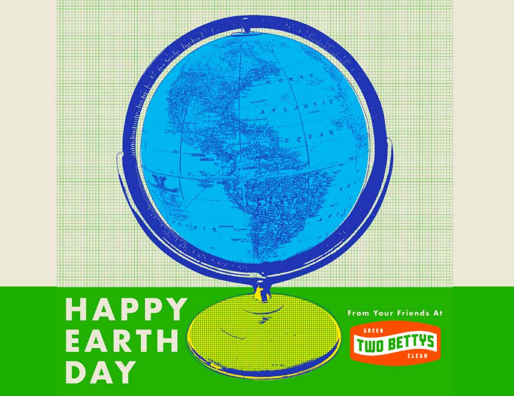 A bright illustration of a globe showing North and South America, with "Happy Earth Day" and Two Bettys logo at the base